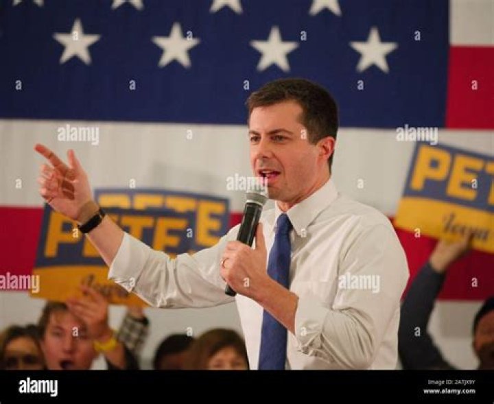 Democratic presidential candidate Pete Buttigieg, the mayor of South Bend, Ind., left, is introduced by his husband Chasten Glezman, right, during a fundraiser at the Wynwood Walls, in Miami Election 2020 Pete Buttigieg, Miami, USA - 20 May 2019