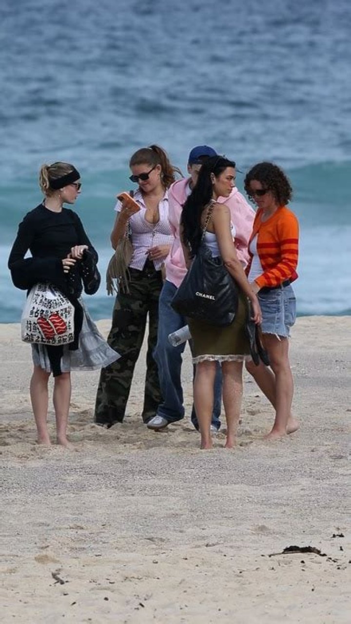 Dua Lipa hits the beach in a crocheted bikini after opening "Future Nostalgia" tour in Miami. The newly single British hitmaker kicked back with with her parents Dukagjin and Anesa on Thursday the morning after rocking the stage during the first show in her world tour. She showed off her flawless bikini body in the eye catching yellow and orange swimsuit as she relaxed on a lounger at her upscale oceanfront hotel. Dua carried her belongings in a striking anime inspired print tote by Spanish luxury label LoewePictured: Dua LipaRef: SPL5288864 100222 NON-EXCLUSIVEPicture by: Pichichipixx.com / SplashNews.comSplash News and PicturesUSA: +1 310-525-5808London: +44 (0)20 8126 1009Berlin: +49 175 3764 Rights