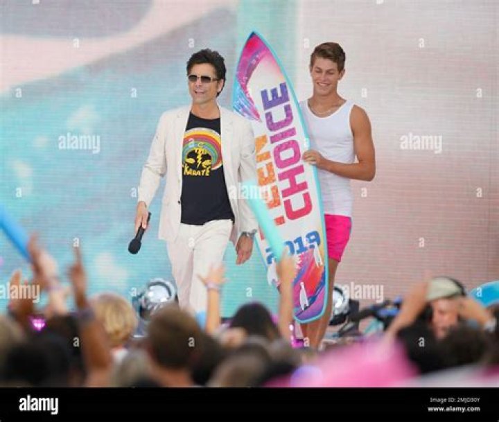 John Stamos presents the choice male web star award at the Teen Choice Awards, in Hermosa Beach, Calif 2019 Teen Choice Awards - Show, Hermosa Beach, USA - 11 Aug 2019