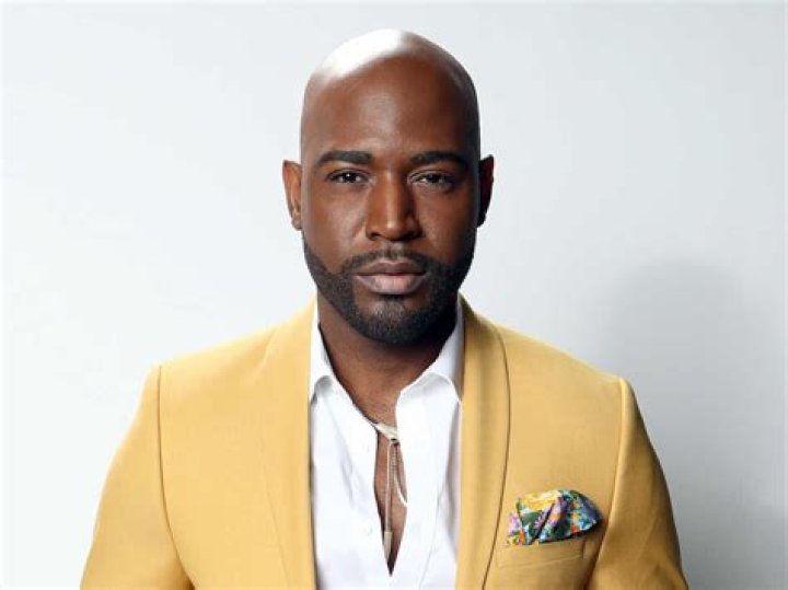 Karamo Brown poses in a &lsquo;DWTS&rsquo; promo pic
