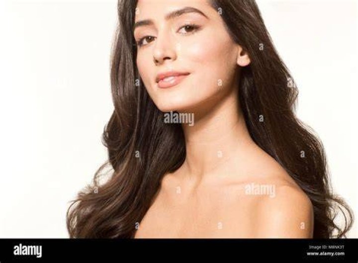 Model released - young woman washing hands Stock
