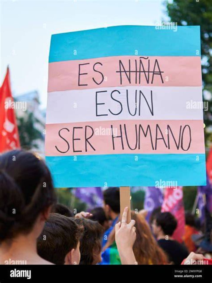 Sama Holds Up A Sign