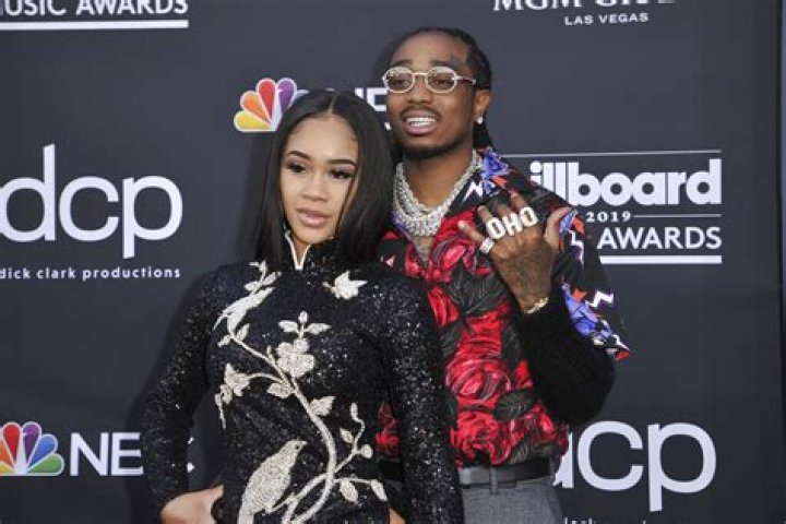 Saweetie, left, and Quavo arrive at the Billboard Music Awards on Wednesday, May 1, 2019, at the MGM Grand Garden Arena in Las Vegas. (Photo by Richard Shotwell/Invision/AP)