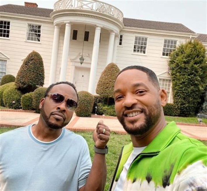 Will Smith poses outside