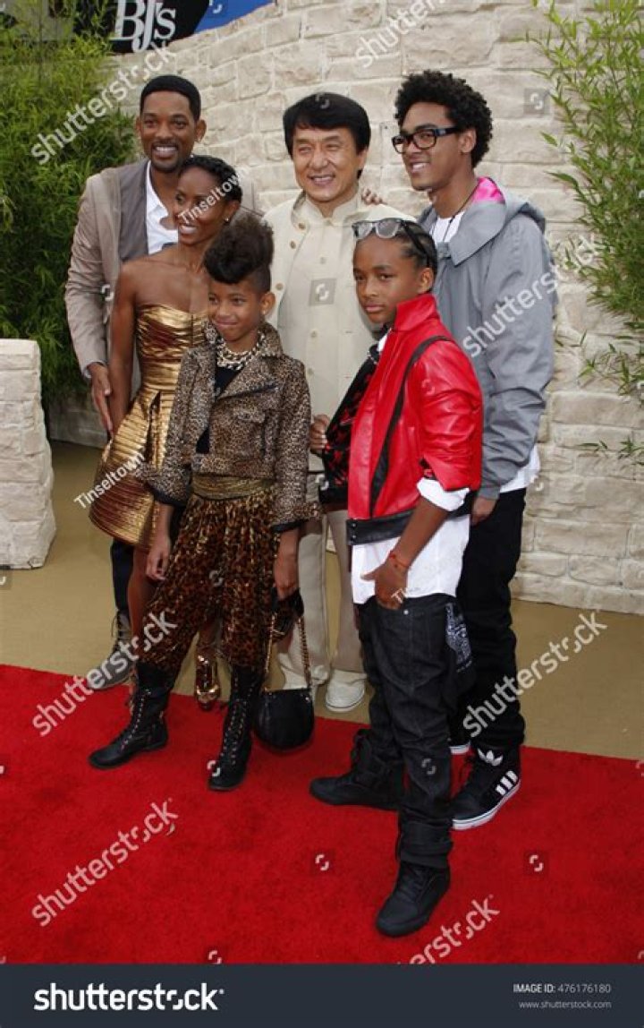 Will Smith poses with Jackie Chan and family